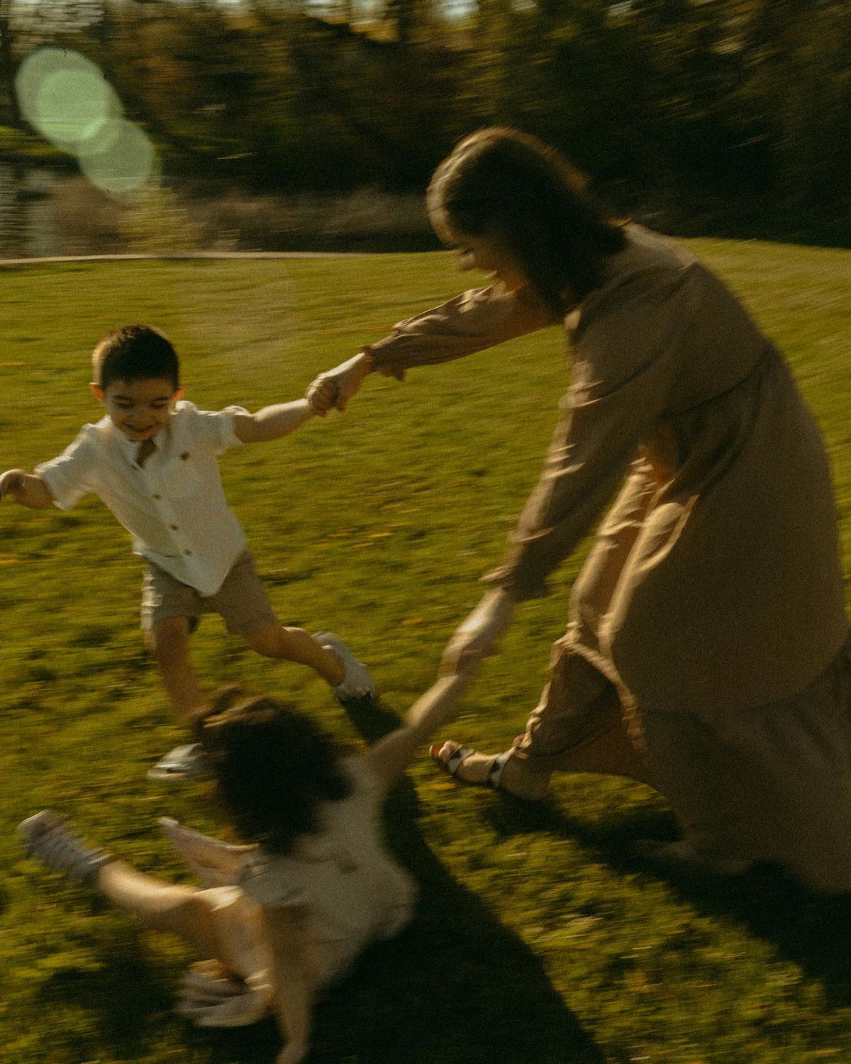 A family playing together outdoors